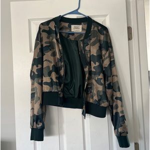 Cutest bomber jacket. You can wear with jeans, leggings, or even shorts!